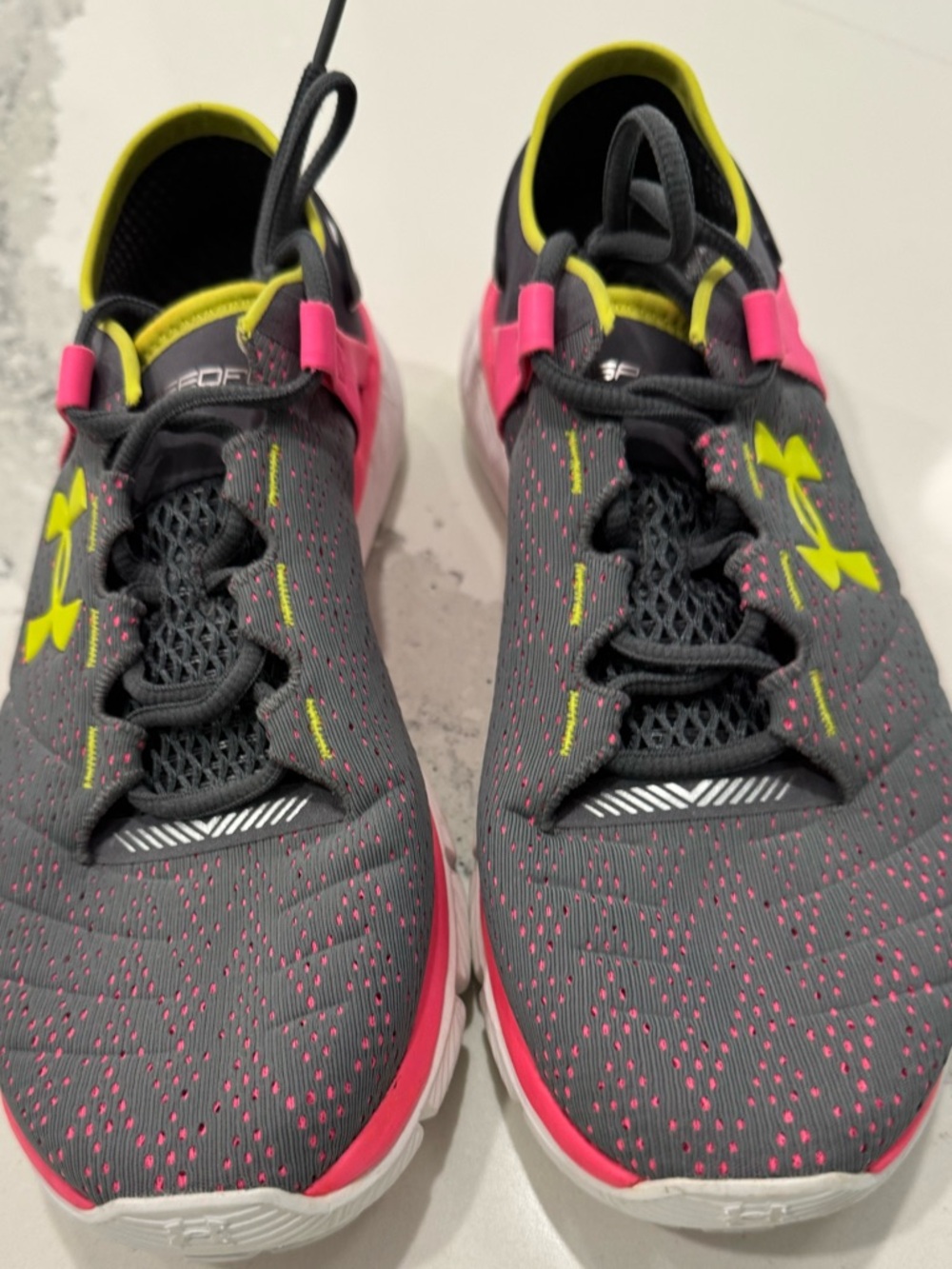 Under Armour  ladies Gray Pink Athletic Shoes with Neon Accents